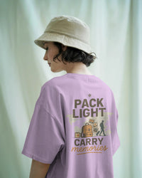 Pack light, carry memories unisexual T shirt