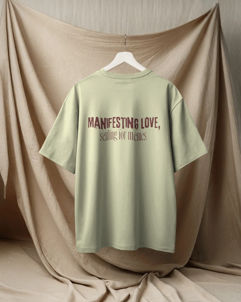 Manifesting love, settling for memes.. Unisexual oversized T-shirt