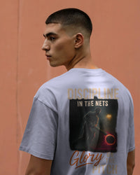 Discipline in the nets, glory on the pitch light.  Unisexual T-shirt